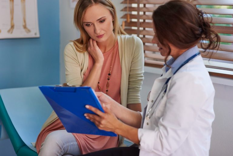 woman routine visit her doctor