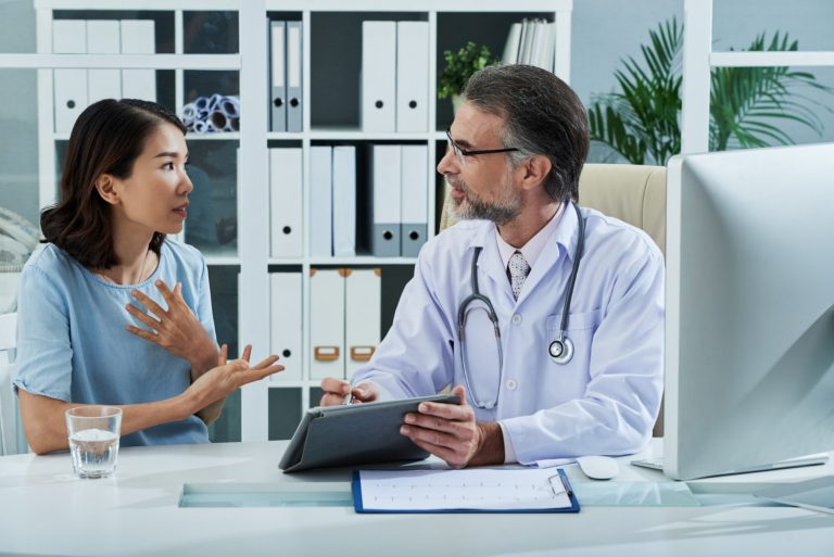 patient telling doctor about symptoms disease